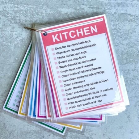 printable chore cards that have been laminated on a binder ring