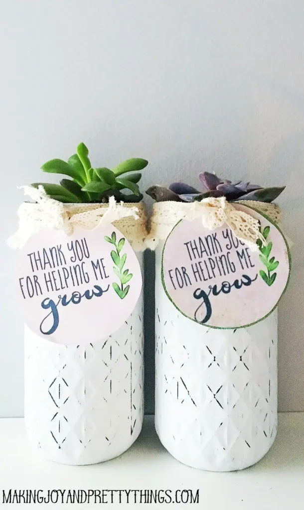 plant teacher gifts with tag that says thank you for helping me grow
