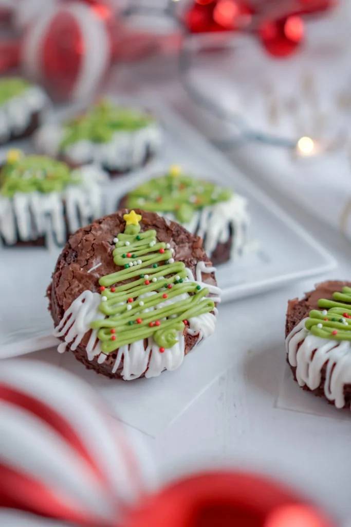 round brownies decorated with chocolate Christmas trees