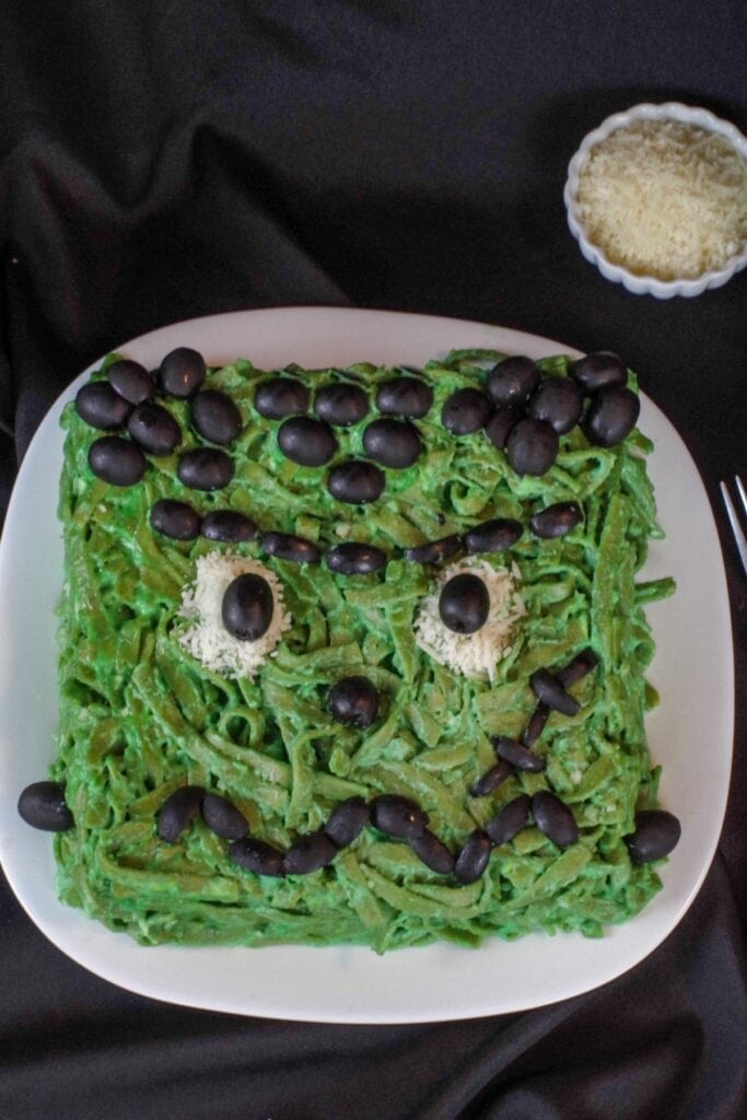 green fettuccini Alfredo shaped like Frankenstein