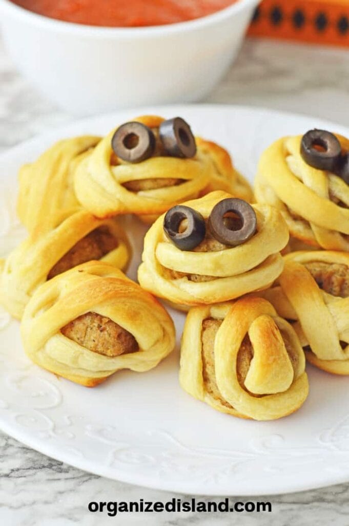 meatballs wrapped in dough to look like Halloween mummies