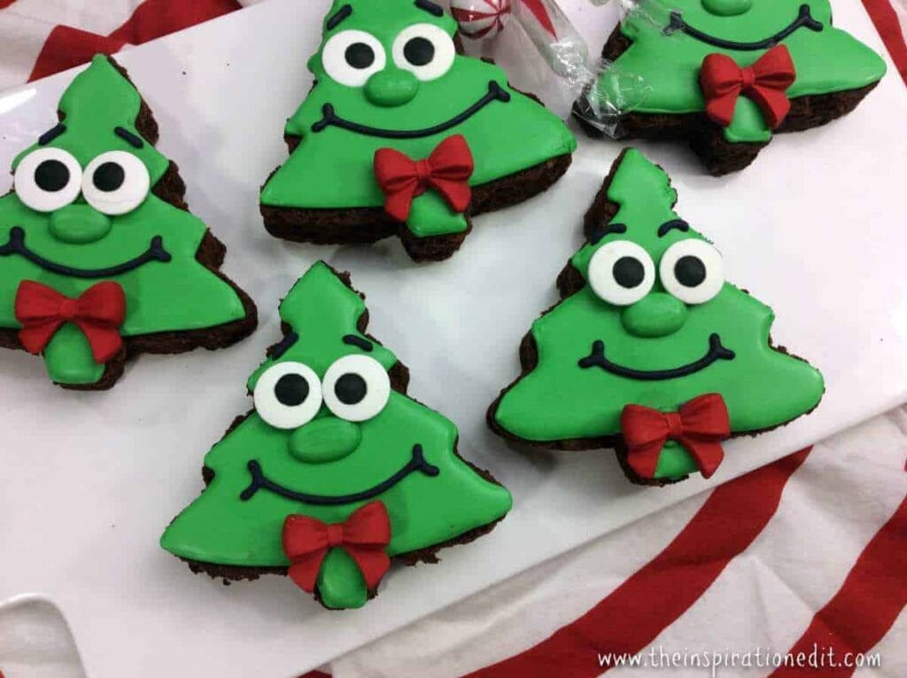 Christmas tree shaped brownies with happy face decorations