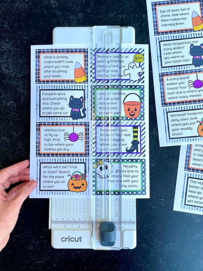 cutting out Halloween treasure hunt clues PDF