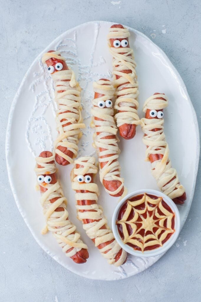 hot dogs wrapped in dough to look like mummies