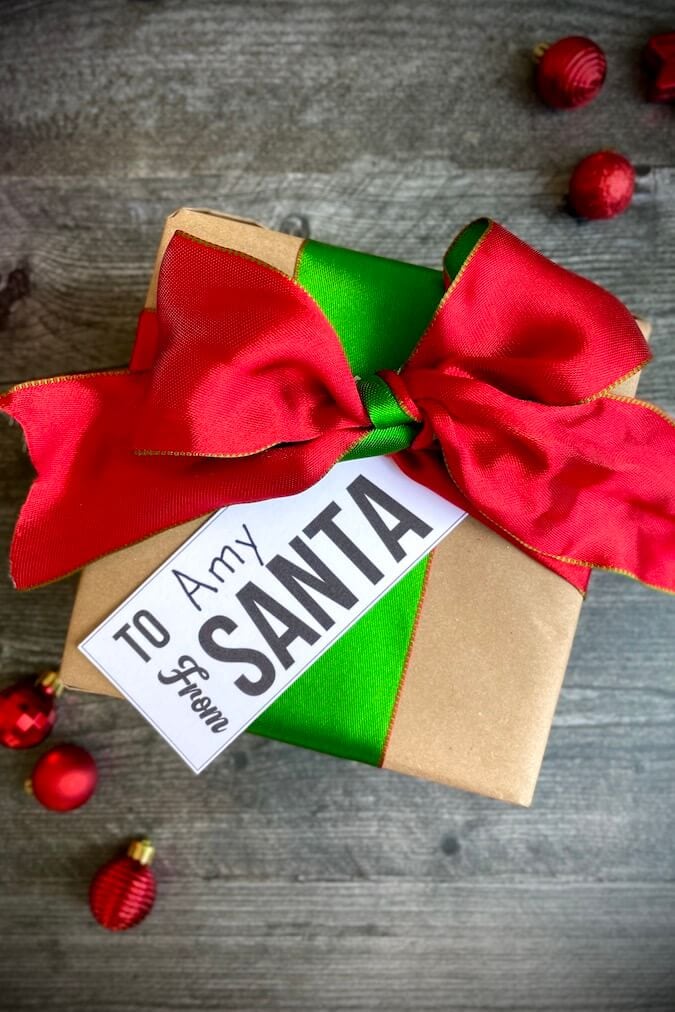 modern black and white santa gift tag on a gift