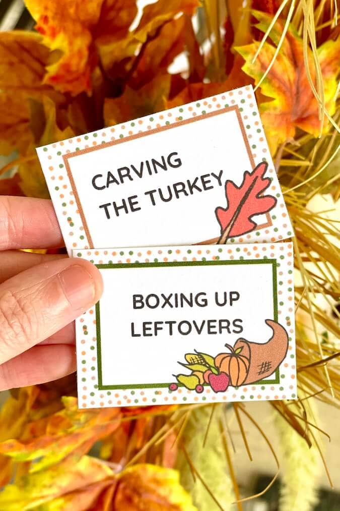 printable Fall charades cards that say carving the turkey and boxing up leftovers