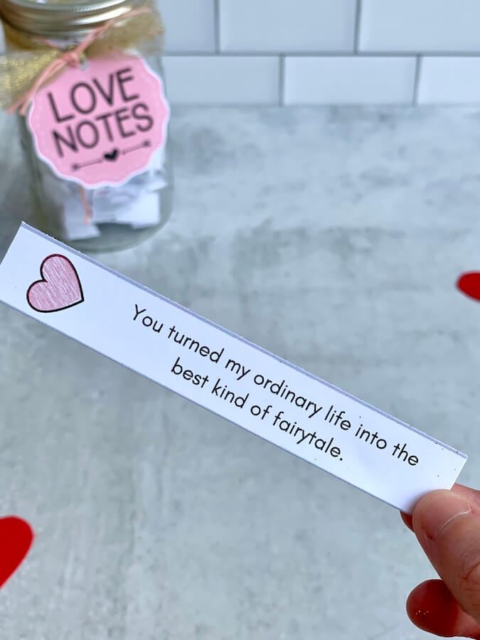 love note printed on a strip of paper