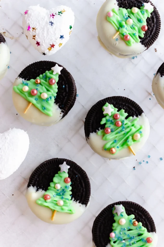 Oreos decorated with Christmas trees