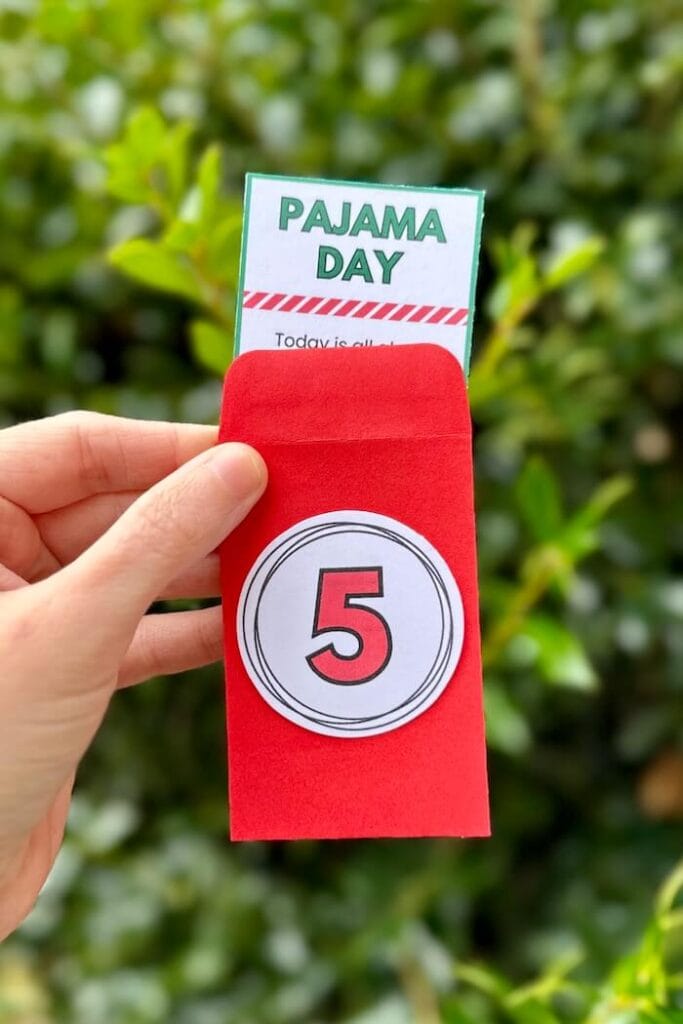 Christmas activity card that says pajama day