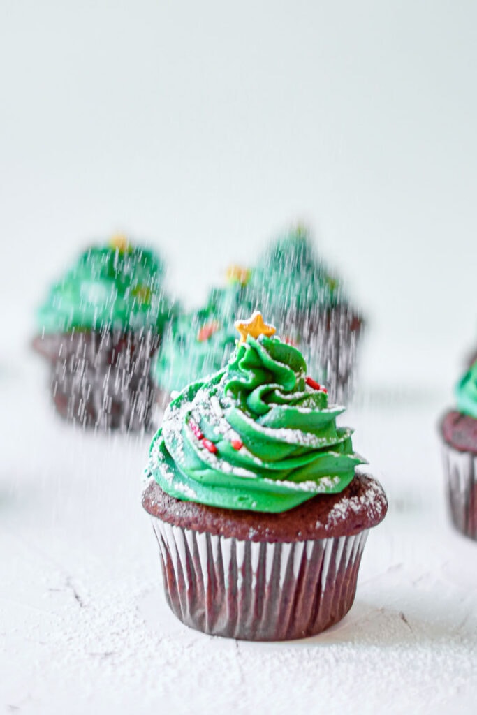 cupcakes decorated to look like Christmas trees