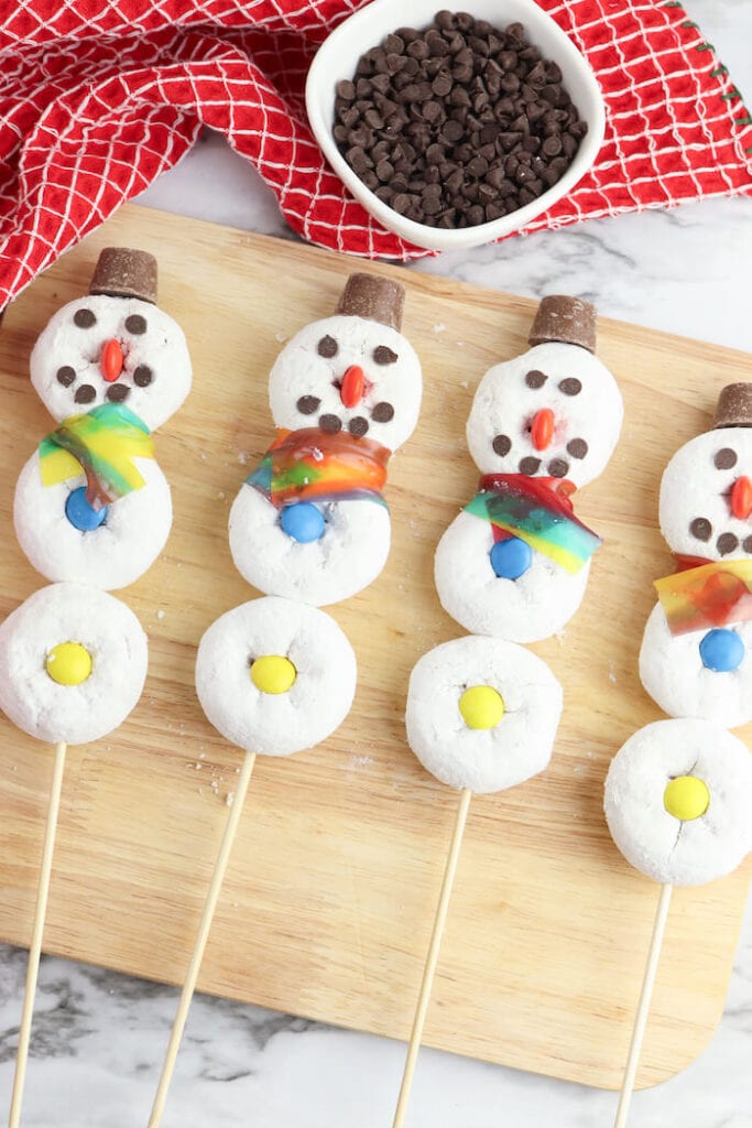 snowman donuts on a cutting board