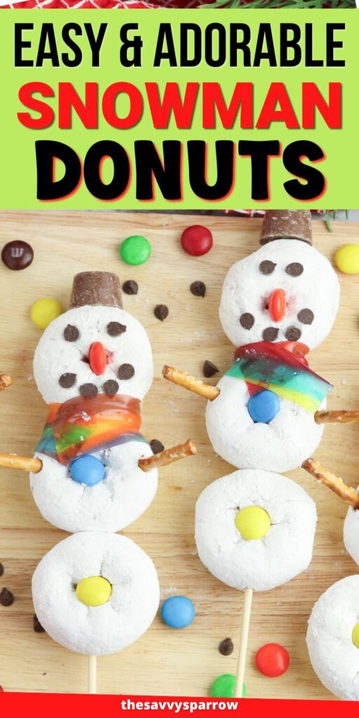 snowman donuts on a stick with powdered donuts and candy