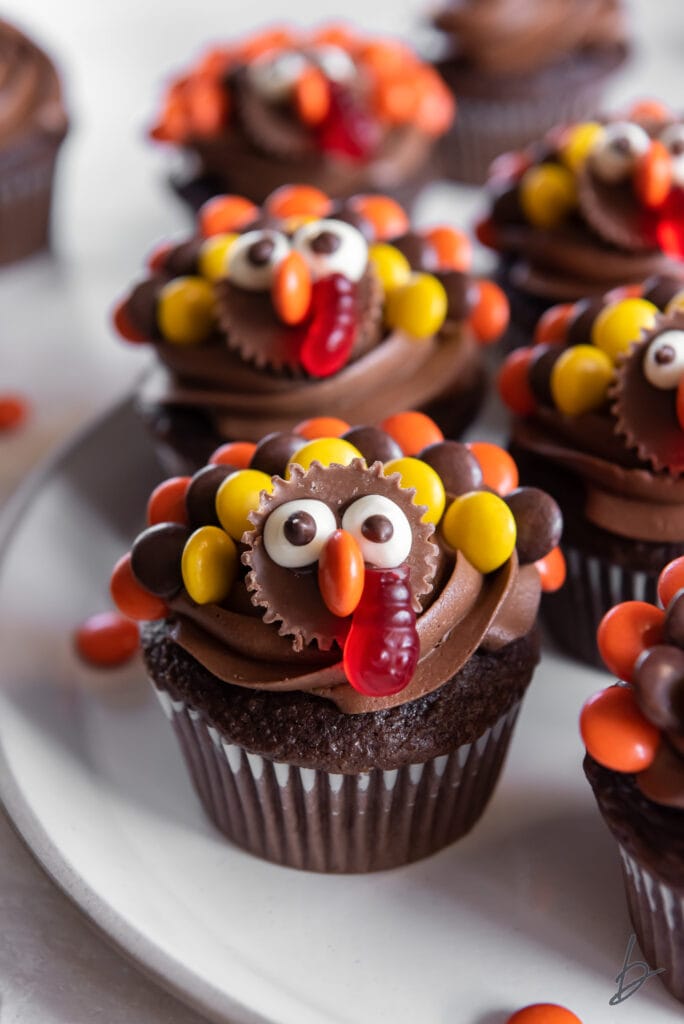 turkey cupcakes made with chocolate frosting and Reese's pieces
