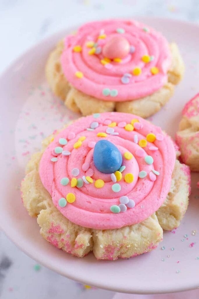 sugar cookies with pink frosting and cadbury eggs