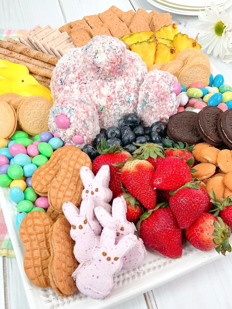 Easter dessert board with a cheeseball shaped like a bunny butt