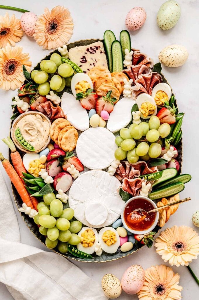 Easter charcuterie board with a bunny shaped out of cheese