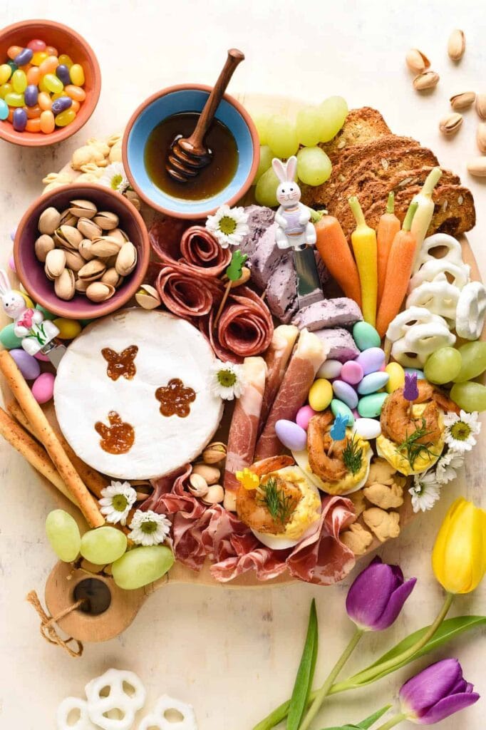 Easter charcuterie board with sweet and salty snacks