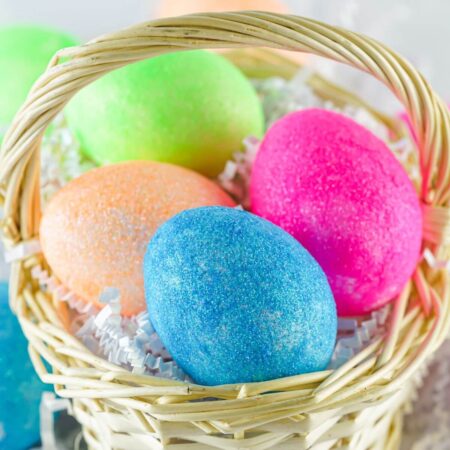 DIY glitter Easter eggs in a basket