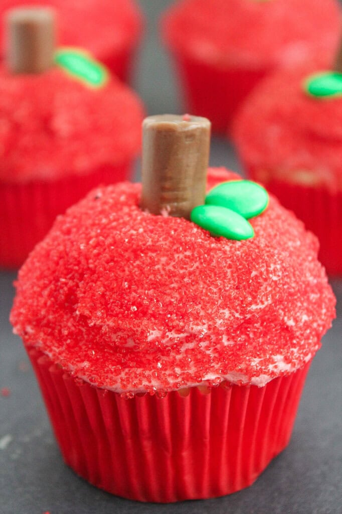 cupcakes decorated to look like apples