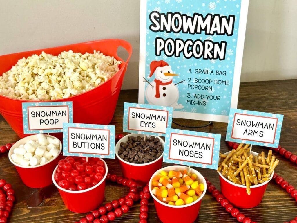 christmas themed popcorn bar with mix ins