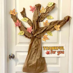 Thankful tree with leaves on a kids bedroom door