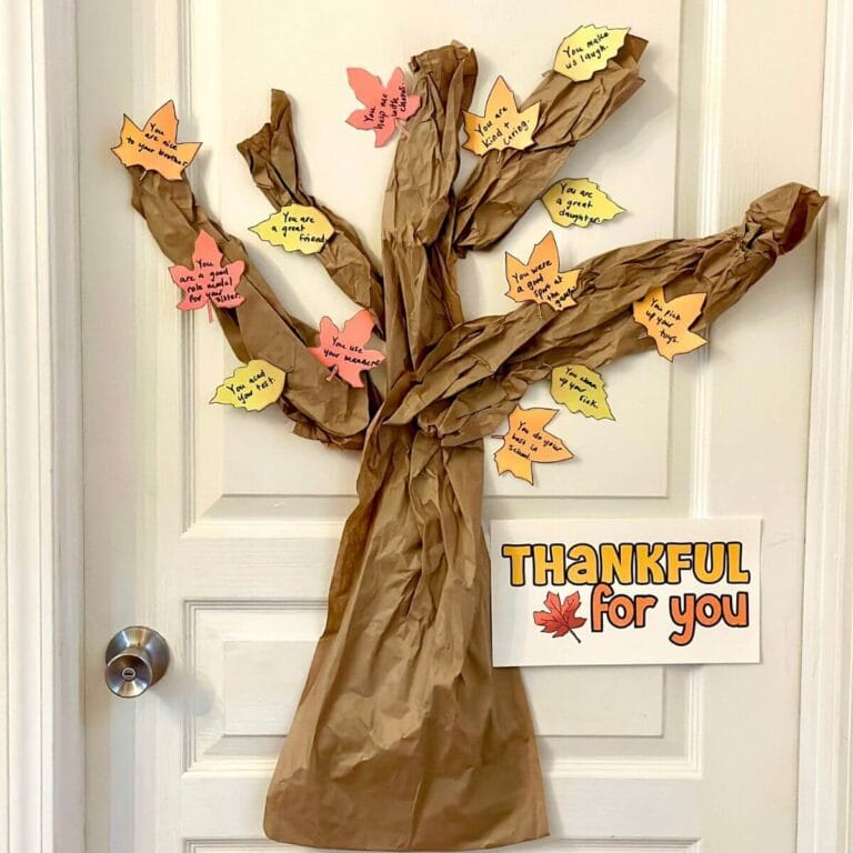 Thankful tree with leaves on a kids bedroom door