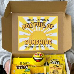 box of sunshine gift with gift tag and yellow items