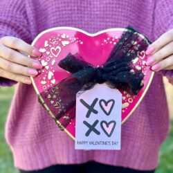 free printable valentine tag that says happy valentine's day tied to a box of chocolate