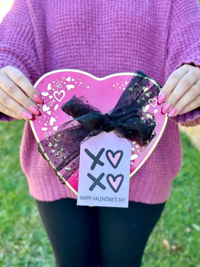 heart shaped box of chocolate with a printable Valentines gift tag