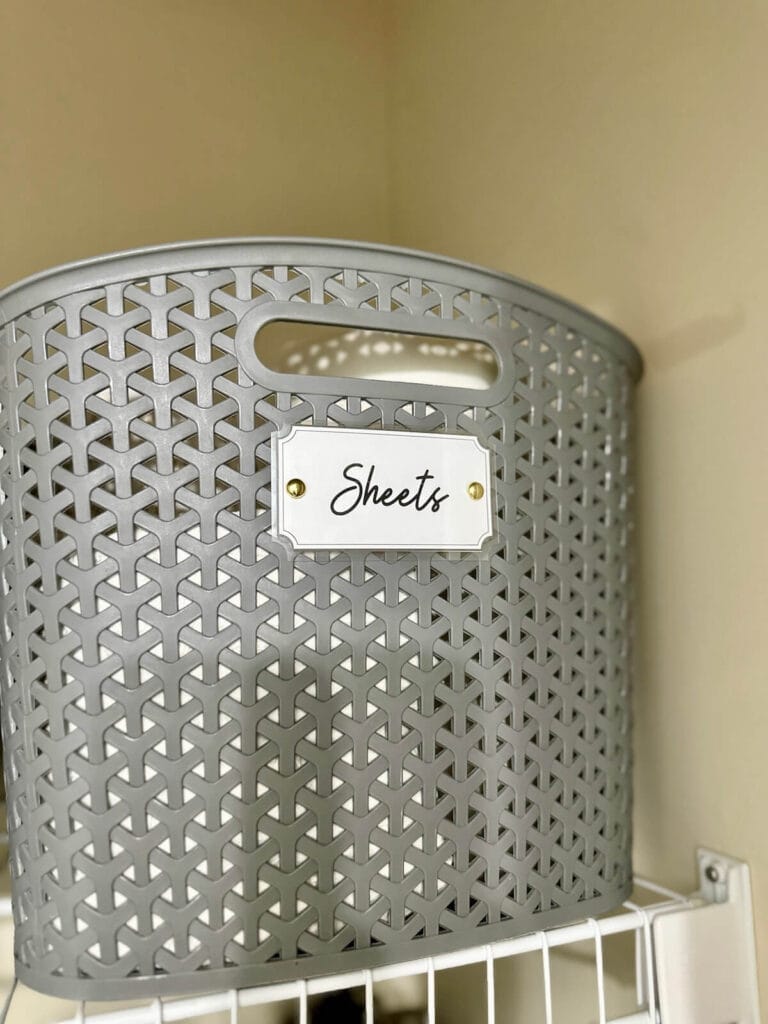 storage basket label that says sheets