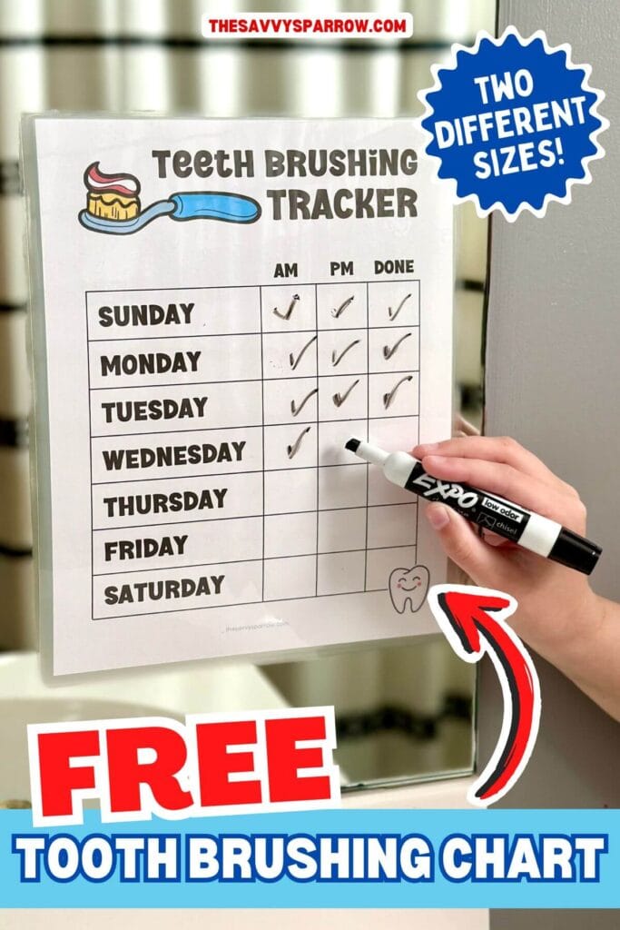 tooth brushing chart hanging on a bathroom mirror