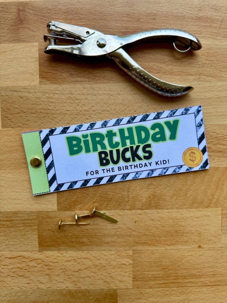 birthday bucks coupon book put together with a hole punch and brads