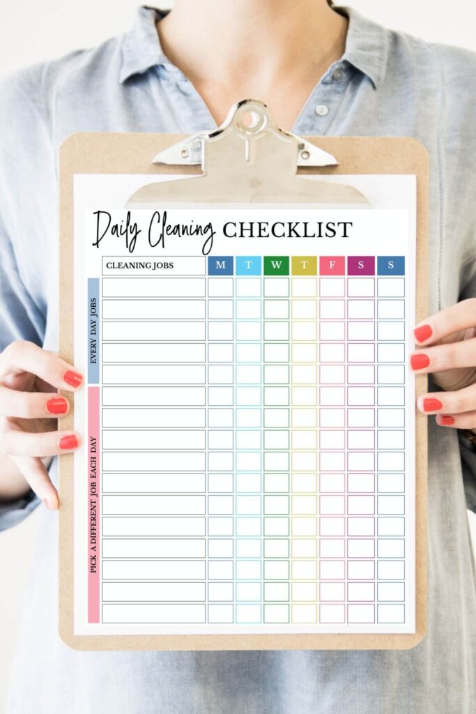 free printable daily cleaning checklist on a clipboard