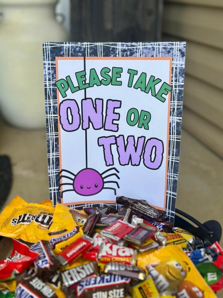 Halloween candy sign that says please take one