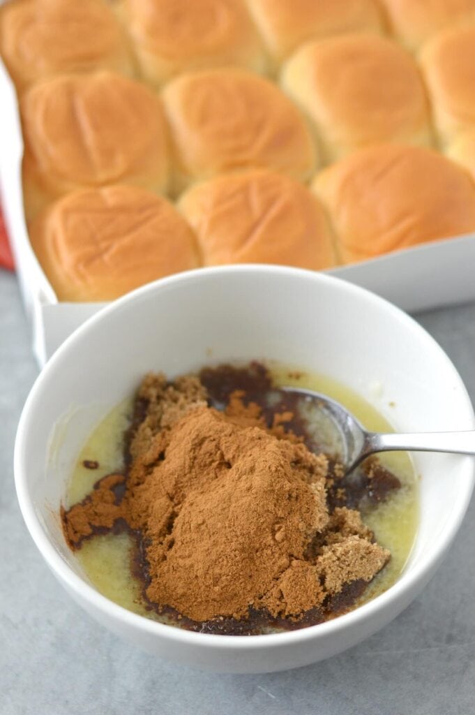 making the butter and brown sugar mixture for cinnamon rolls