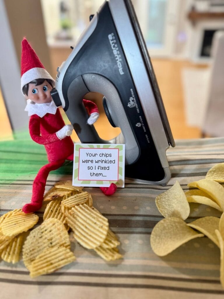 Elf on the Shelf with flat and crinkle cut potato chips with an iron