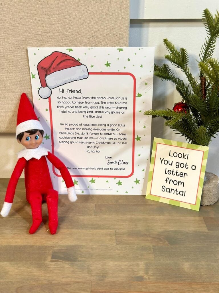 Elf on the Shelf sitting next to a printable letter from Santa