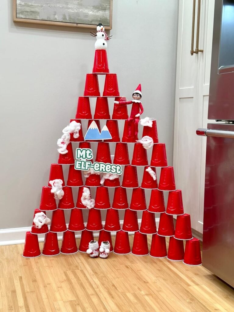 red cups stacked up and a sign that says "Mt. Elferest"