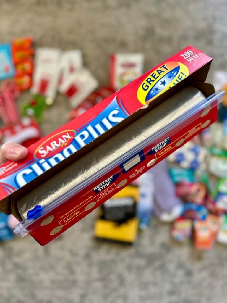 a roll of Saran wrap with a slide cutter on the box