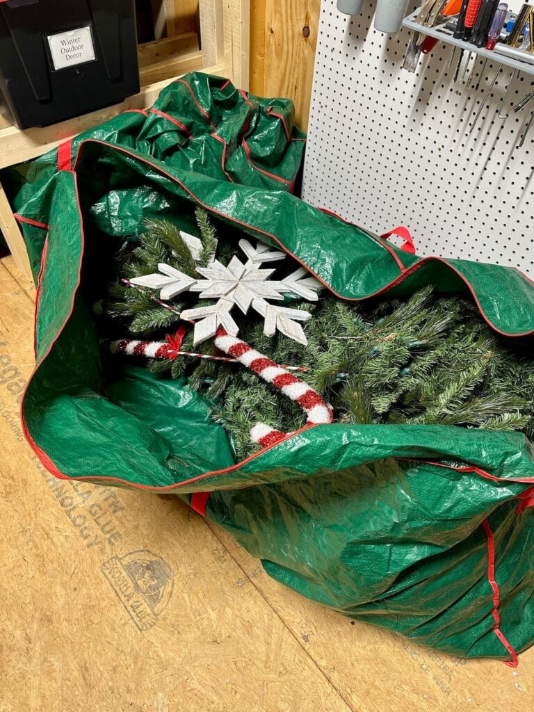 storing large Christmas decor items in a tree bag