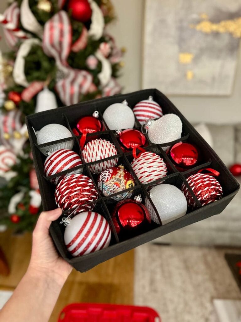 Christmas ornaments stored in a fabric drawer organizer