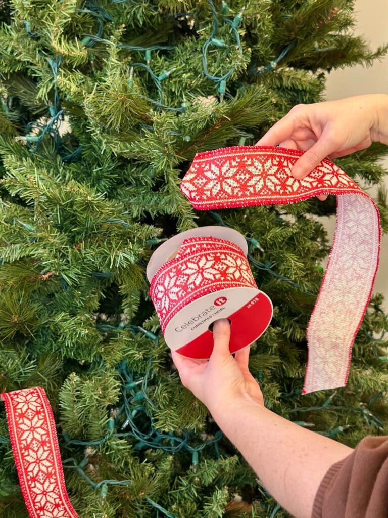 putting Christmas ribbon back on a spool