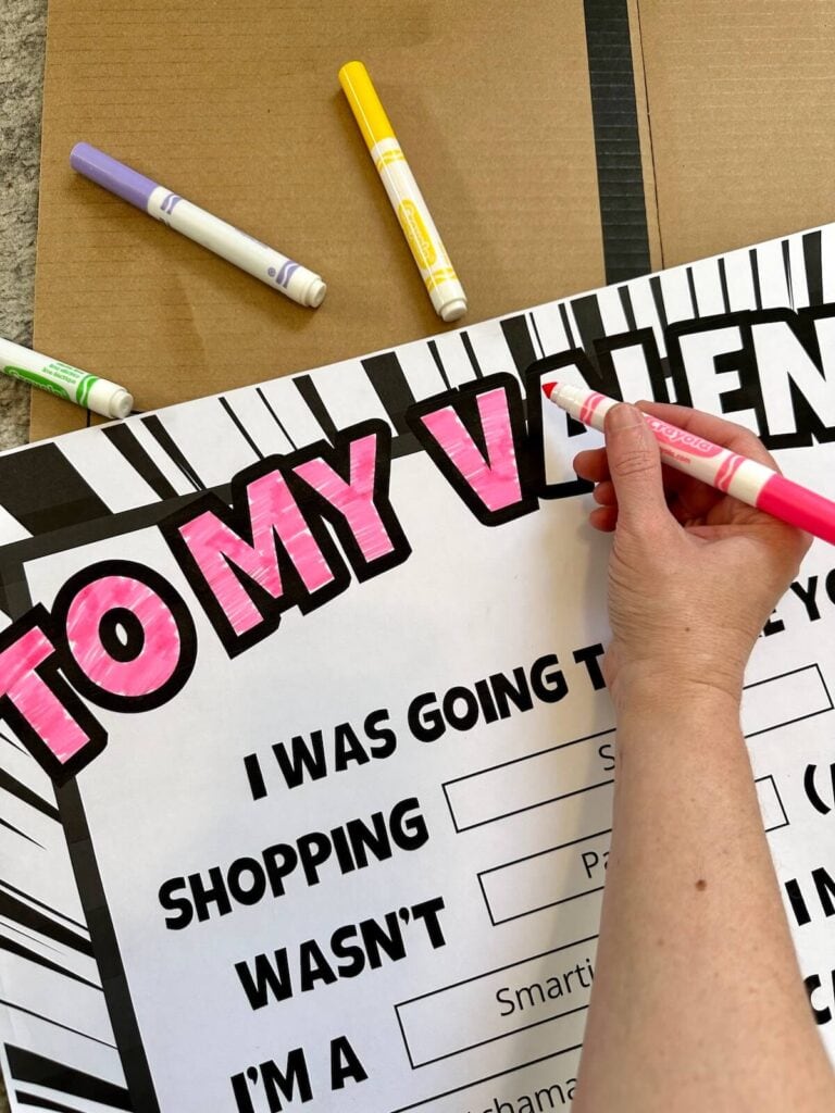 coloring in a Valentine candy gram that says to my valentine