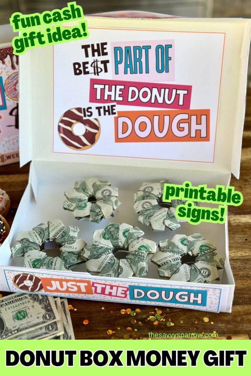 dollar bills folded in the shapes of donuts inside a donut box money gift