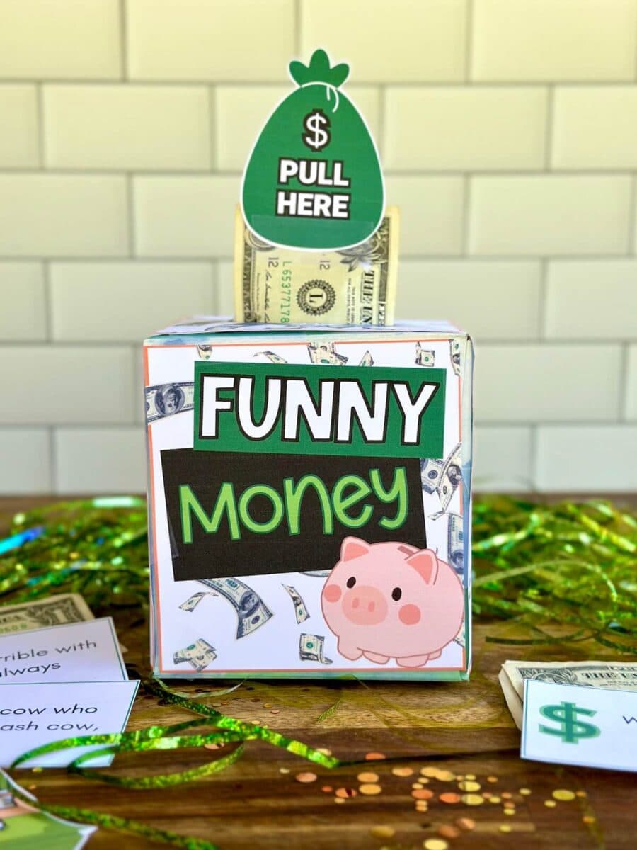 DIY tissue box money gift with printables that say "funny money" and dollar bill coming out of the top