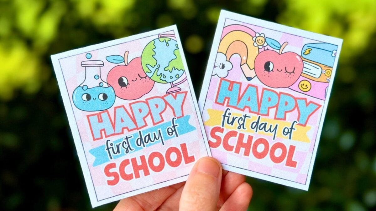 two printable gift tags that say "Happy First Day of School" with colorful school themed designs